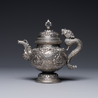 A fine Tibetan silver plated 'bajixiang' teapot, 19th C.