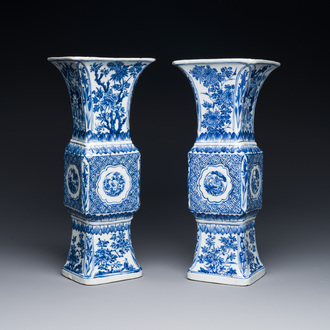 A pair of Chinese blue and white 'gu' vases with floral design, Kangxi