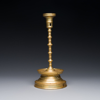 A knotted bronze candlestick, Southern Netherlands, probably 16th C.