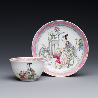 A Chinese famille rose cup and saucer with a court lady and a boy, Yongzheng