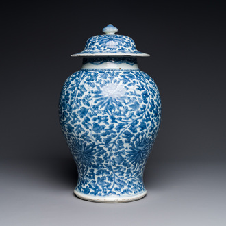 A Chinese blue and white 'lotus scroll' vase and cover, Kangxi