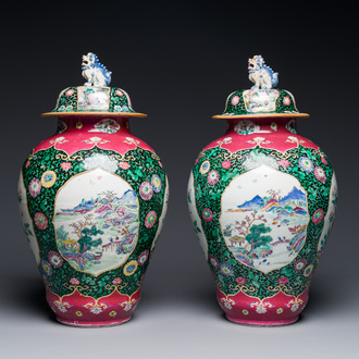 A pair of Chinese famille rose black-ground jars and covers with mountainous landscape design, Yongzheng