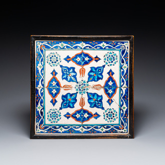 Four Iznik-style tiles with stylized floral design, Kutahya, Turkey, 19th C.