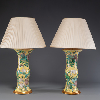 A pair of Chinese verte biscuit 'gu' vases with gilt bronze lamp mounts, 19th C.