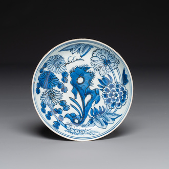 A Chinese blue and white plate with floral design, Xuande mark, Wanli