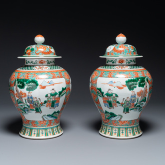 A pair of Chinese famille verte 'Wen Wang Fang Xian 文王訪賢' vases and covers, 19th C.