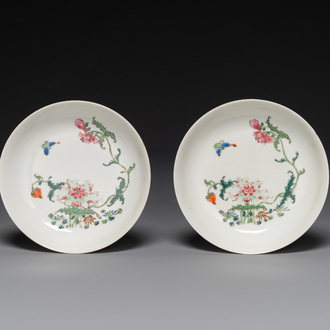 A pair of Chinese famille rose 'peony and butterfly' plates, Yongzheng/Qianlong