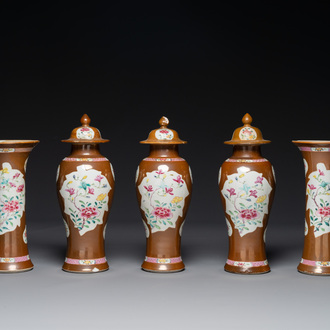 A Chinese capucin-brown-ground famille rose garniture of five vases with floral design, Qianlong