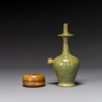 A Chinese yellow-glazed marbled covered box and a green-glazed marbled ewer, Tang/Song