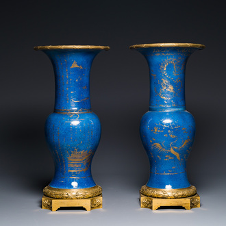 A pair of Chinese gilt-decorated powder-blue 'yenyen' vases with gilt bronze mounts, Kangxi