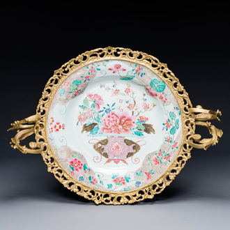 A Chinese famille rose 'flower basket' dish with gilt bronze mount, Yongzheng