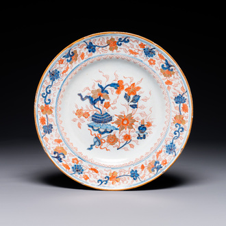 A Dutch Delft Imari-style dish with antiquities, 'AK' mark, 18th C.