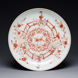 A Chinese wucai dish with figural and floral design, Jiajing mark, Transitional period