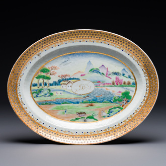 An oval Chinese monogrammed Canton famille rose dish with landscape design, 19th C.