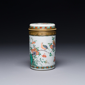 A Chinese famille verte cylindrical box and cover with gilt bronze mount, Kangxi