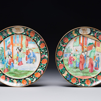 A pair of Chinese monogrammed Canton famille rose plates with black-glazed rims, 19th C.