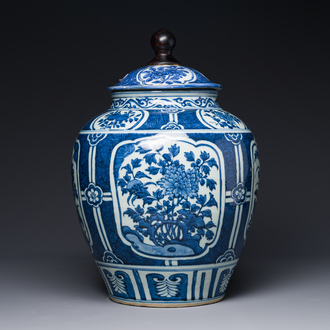 A Chinese blue and white jar and cover with floral design, Wanli