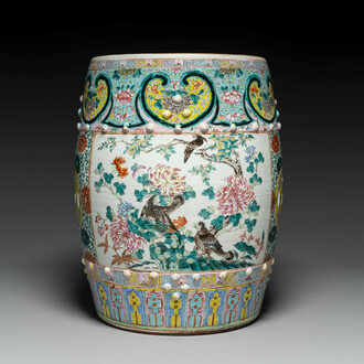 A Chinese famille rose garden seat with birds among blossoming branches, 19th C.