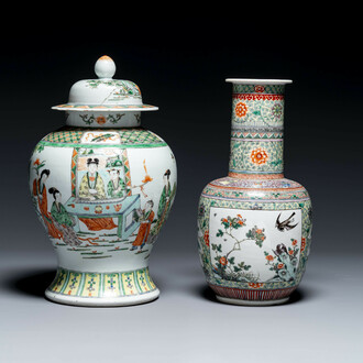 A Chinese famille verte covered vase and a bottle vase, 19th C.