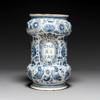 A large Italian blue, white and manganese albarello drug jar inscribed Charitas, probably Savona, dated 1767