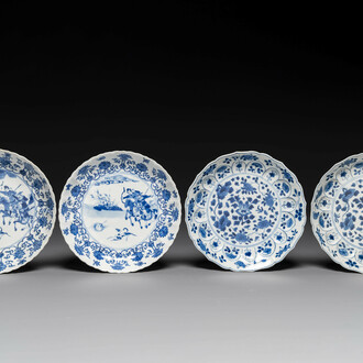 A pair of Chinese blue and white 'Mongolian hunting scene' plates and a pair of plates with floral design, Chenghua and Kangxi mark, Kangxi