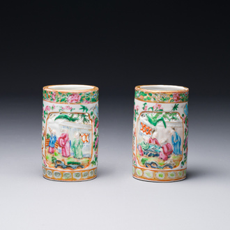 A pair of Chinese reticulated Canton famille rose brush pots, 19th C.