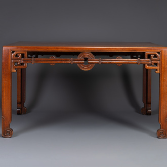 A large rectangular Chinese huanghuali wooden table, 19/20th C.