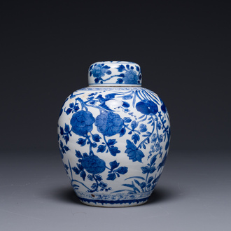 A Chinese blue and white jar and cover with floral design, Kangxi