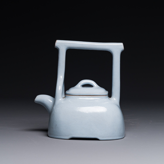 A Chinese monochrome clair-de-lune-glazed Yixing stoneware teapot and cover, Yixing seal mark, Republic