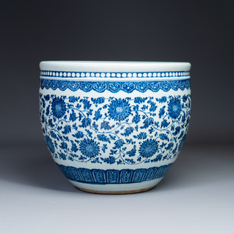 A large Chinese blue and white 'peony scroll' fish bowl, Qianlong/Jiaqing