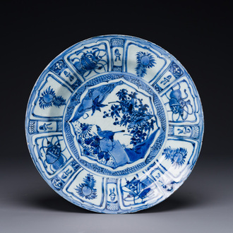 A Chinese blue and white kraak porcelain dish with birds among blossoming branches, Wanli