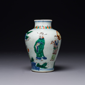 A small Chinese wucai jar with figures in a landscape, Transitional period