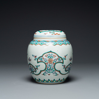 A Chinese doucai 'lotus scroll' jar and cover, Kangxi/Yongzheng