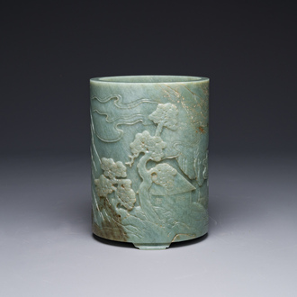 A Chinese spinach jade brush pot with relief design, 18th C.