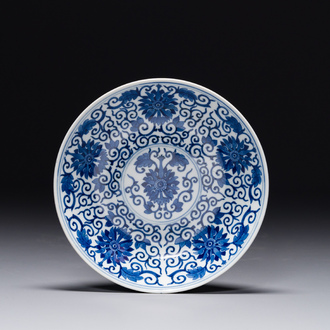 A Chinese blue and white 'lotus scroll' plate, Guangxu mark and of the period