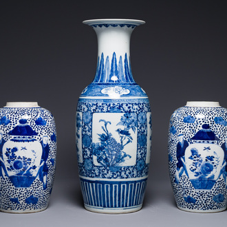 A pair of Chinese blue and white jars and a vase, Kangxi mark, 19th C.