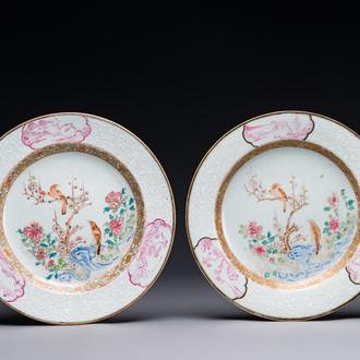 A pair of Chinese famille rose 'magpie and peony' plates with bianco-sopra-bianco rims, Yongzheng