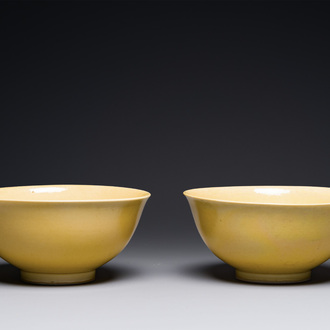 A pair of Chinese monochrome yellow-glazed bowls, Yongzheng mark, 19th C