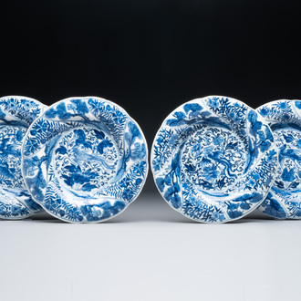 Four Chinese blue and white lobed 'phoenix and monkey' plates, flower mark, Kangxi