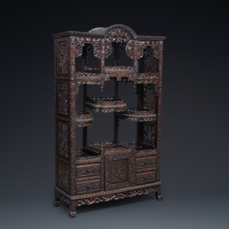 A richly carved Chinese hongmu wooden étagère cupboard, Canton, 19th C.