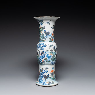 A Chinese doucai 'gu' vase with roosters, Qianlong mark, 19th C.