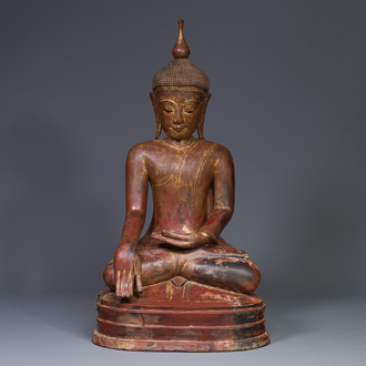 A large Burmese gilt lacquer Buddha in bhumisparsha mudra, 19/20th C.