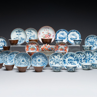 A collection of 23 Chinese cups and saucers, Kangxi/Qianlong