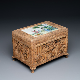 A Chinese Canton carved wooden casket with a famille rose plaque, Republic