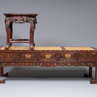 A Chinese carved wooden stand and a low table with marble tops, 19th C.