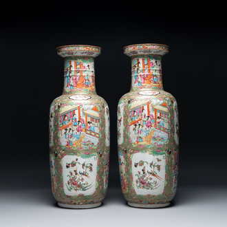 A pair of Chinese Canton famille rose rouleau vases, 19th C.