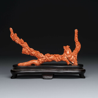 A Chinese red coral 'Eight Immortals' group on wooden stand, 19/20th C.