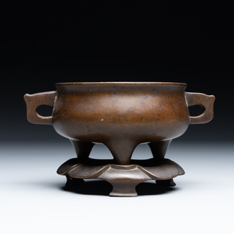 A Chinese bronze censer and stand, Xuande mark, 17th C.