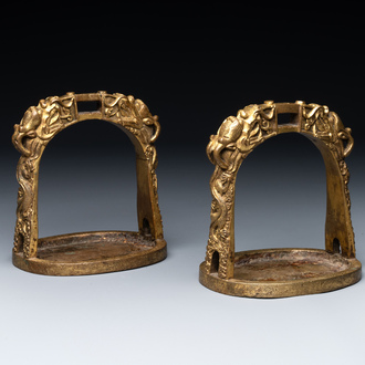 A pair of Chinese imperial gilt-bronze stirrups with dragons, De 德 mark, 18th C.