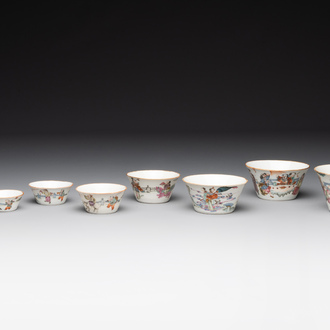 A rare set of eight Chinese famille rose 'Sanxing' nesting bowls, Tongzhi mark and of the period
